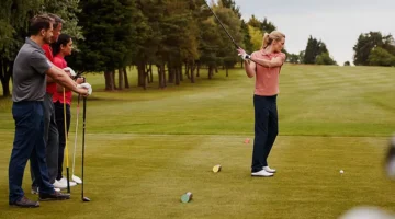 two-couples-golfing-hitting-tee-shot two-couples-golfing-hitting-tee-shot